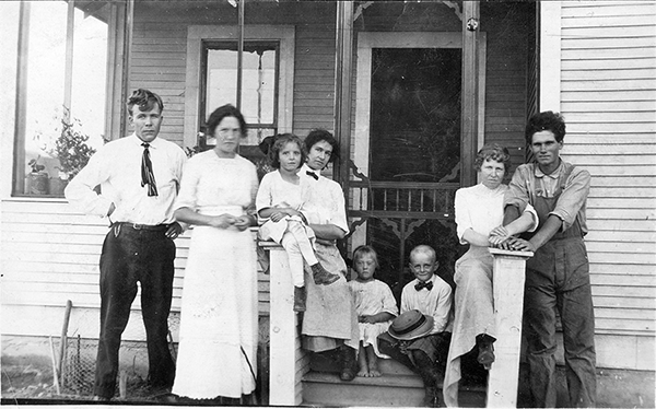 Group in front of home on Mumbarto Street