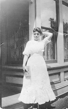 Woman in front of Ustick Merc